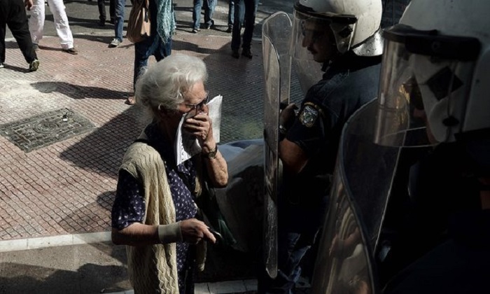 Greek police fire teargas at pensioners during anti-austerity protest 